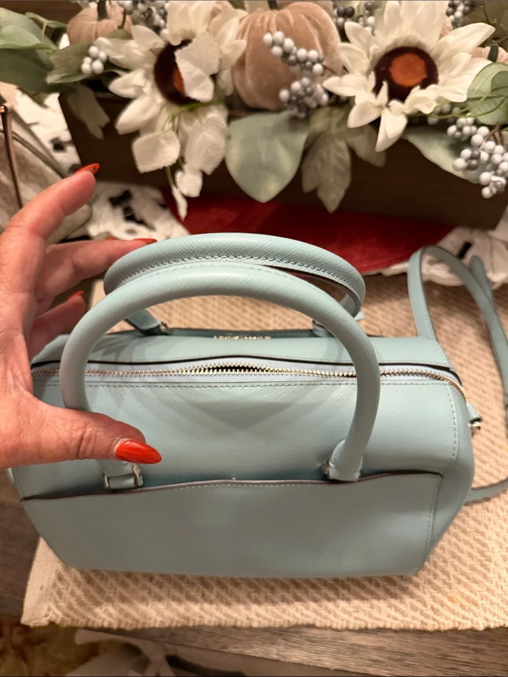 Kate Spade Devyn Medium Duffel Bag in the color Frosted Spearmint, featuring